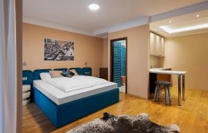 Postel nebo postele na pokoji v ubytování SWU Magazine Rooms