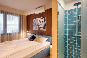 Postel nebo postele na pokoji v ubytování SWU Magazine Rooms