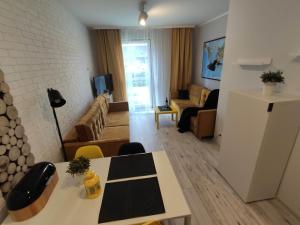 Telewizja i/lub zestaw kina domowego w obiekcie Black House