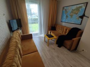 Telewizja i/lub zestaw kina domowego w obiekcie Black House