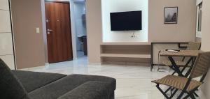 TV a/nebo společenská místnost v ubytování CENTRAL