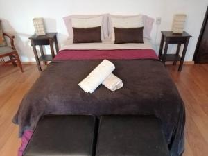 Postel nebo postele na pokoji v ubytování Casona La Oculta Mendoza + 52 fotografií