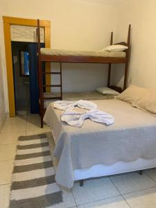 Postel nebo postele na pokoji v ubytování Suítes Casa da Colônia