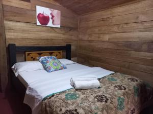 Postel nebo postele na pokoji v ubytování Cabañas el Portal