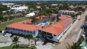 an aerial view of a building with an orange roof at Sueds Segundo Sol in Santa Cruz Cabrália