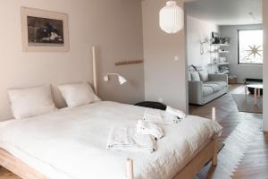 Postel nebo postele na pokoji v ubytování Stylish apartment near the historic center