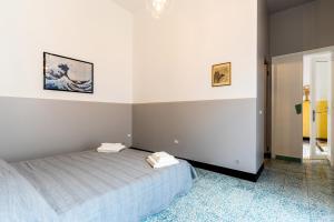 Katil atau katil-katil dalam bilik di LE CASE camera doppia con bagno privato e terrazza