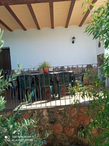 A balcony or terrace at Casa rural PERALTA S CAZORLA PISCINA COMPARTIDA