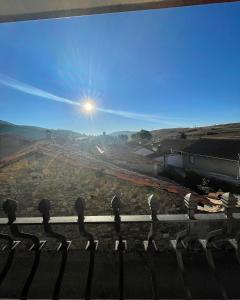 a view of a train station with the sun in the sky at Casa Obis in Muñeca