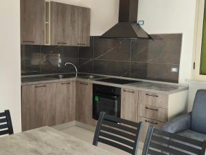 A kitchen or kitchenette at Fantasia B&B APARTAMENT STUDIO