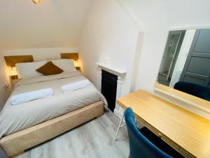 Voodi või voodid majutusasutuse Cosy flat in London toas