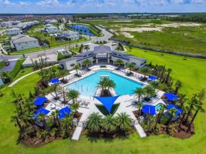 an aerial view of the pool at the resort at New Lovely Home at Sonoma Resort at Tapestry in Kissimmee