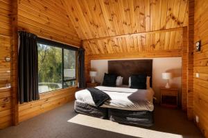 Voodi või voodid majutusasutuse Tongariro Lodge toas