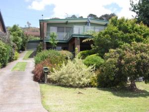 a house with a walkway in front of it at Family Beach Home Dromana in Dromana