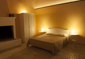 En eller flere senger på et rom på Palazzo Moccia