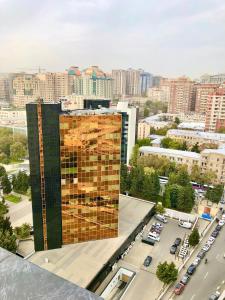 a view of a building in a city at 10 out of 10 VIP Sea view apartment with terrace in Baku