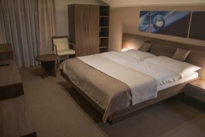 Postel nebo postele na pokoji v ubytování Restaurace a Penzion U Klásků