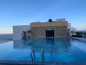 Der Swimmingpool an oder in der Nähe von Apec 5 sao TP.Tuy Hòa - View biển và view hồ bơi