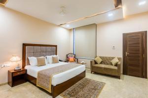 Postel nebo postele na pokoji v ubytování ama Stays & Trails Talia Costa, Udaipur + 8 fotografií