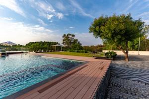 Bazén v ubytování ama Stays & Trails Talia Costa, Udaipur nebo v jeho okolí