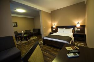 Postel nebo postele na pokoji v ubytování Hotel Požega