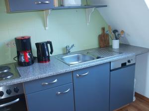 Kuchyň nebo kuchyňský kout v ubytování Kajüthus Apartment 3 + 5 fotografií