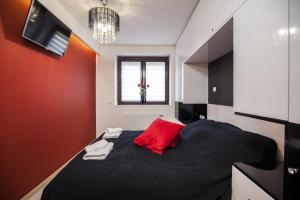 Tempat tidur dalam kamar di Apartament President Zakopane