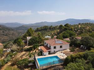 an aerial view of a house with a swimming pool at Maison écologique avec piscine in La Puerta de Segura