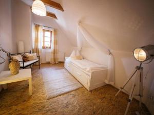 A bed or beds in a room at Chalet in Feistritz near Petzen Ski Area