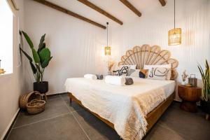 Krevet ili kreveti u jedinici u okviru objekta CasaCarma III, private pool, boho design, central