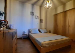 Postel nebo postele na pokoji v ubytování Villa Adeiata