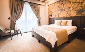 Postel nebo postele na pokoji v ubytování Pinhan Otel Kazdağıları
