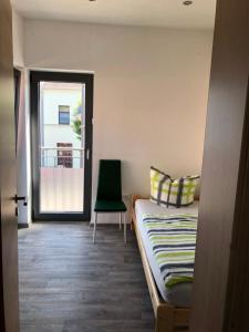 Postel nebo postele na pokoji v ubytování Ferienwohnung Zeitler