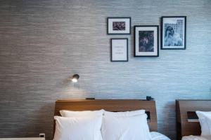 Postel nebo postele na pokoji v ubytování The PLAZA HOTEL S4W12