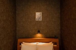 Postel nebo postele na pokoji v ubytování The PLAZA HOTEL S4W12