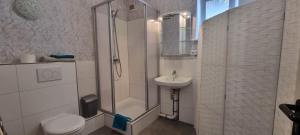 Ένα μπάνιο στο Appartement Hertha