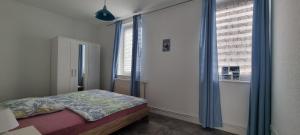 Ένα ή περισσότερα κρεβάτια σε δωμάτιο στο Appartement Hertha