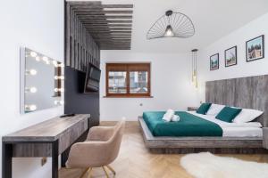 Posteľ alebo postele v izbe v ubytovaní Premium Apartments Salwatoriańska Mountain View Zakopane by Renters Prestige