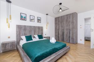 Posteľ alebo postele v izbe v ubytovaní Premium Apartments Salwatoriańska Mountain View Zakopane by Renters Prestige