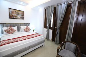 Katil atau katil-katil dalam bilik di Hotel Nature View Green Park Metro Couple Friendly New Delhi