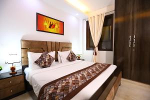 Katil atau katil-katil dalam bilik di Hotel Nature View Green Park Metro Couple Friendly New Delhi