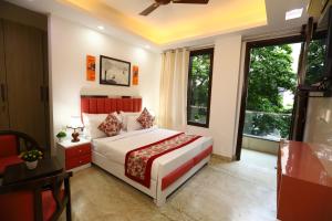 Katil atau katil-katil dalam bilik di Hotel Nature View Green Park Metro Couple Friendly New Delhi