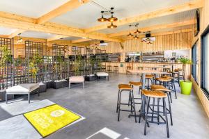 Гостиная зона в Camping maeva Escapades Les Cottages de Perpignan