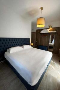 Postel nebo postele na pokoji v ubytování Boutique Hotel Palazzo Donna Iulia