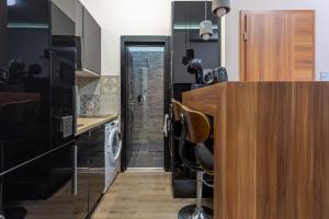 Kuchyňa alebo kuchynka v ubytovaní Goldcentral Apartments Akacfa Studios