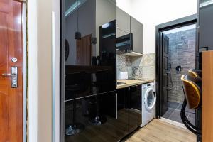 Kuchyňa alebo kuchynka v ubytovaní Goldcentral Apartments Akacfa Studios
