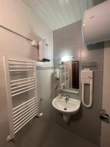 Ένα μπάνιο στο Apartment in Belvedere Club G205