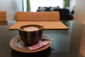 Een zitgedeelte bij Imperial Suites Hotel