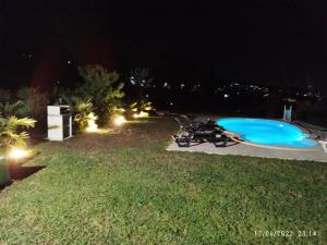 A piscina localizada em Quinta de Carvalhal - Casa de Campo ou nos arredores