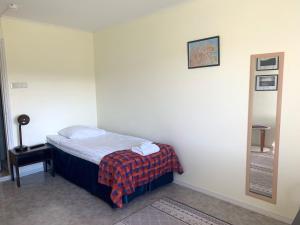 Postel nebo postele na pokoji v ubytování Hotel Utsjoki